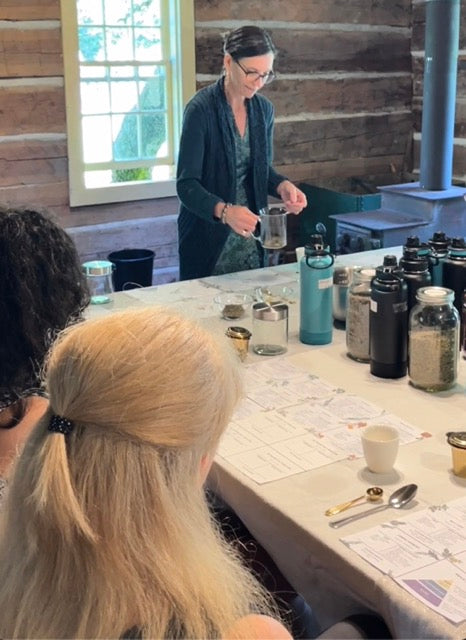 Bree providing a private tea workshop experience on herbal tea blending