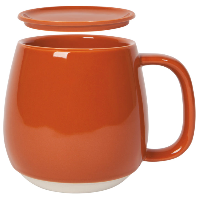Orange mug with matching lid for tea coffee hot chocolate chai.