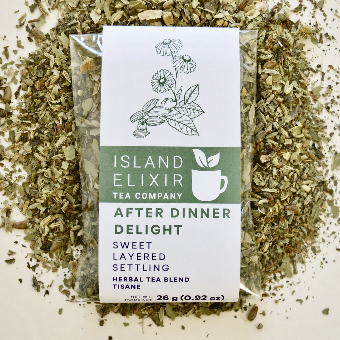 After Dinner Delight Herbal Tea 10 cups of tea size compostable packaging sitting on loose leaf tea that contains Fennel seed*, milk thistle seed*, green cardamom*, bay leaf*, lemon*, lemon balm*, peppermint*, chamomile*.