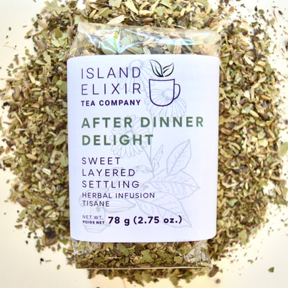 After Dinner Delight Herbal Tea 30 cups of tea size compostable packaging sitting on loose leaf tea that contains Fennel seed*, milk thistle seed*, green cardamom*, bay leaf*, lemon*, lemon balm*, peppermint*, chamomile*.