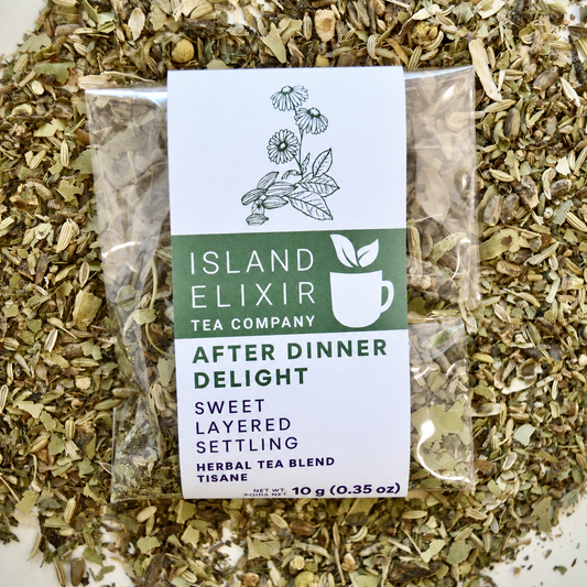 After Dinner Delight Herbal Tea 4 cups of tea size compostable packaging sitting on loose leaf tea that contains Fennel seed*, milk thistle seed*, green cardamom*, bay leaf*, lemon*, lemon balm*, peppermint*, chamomile*.