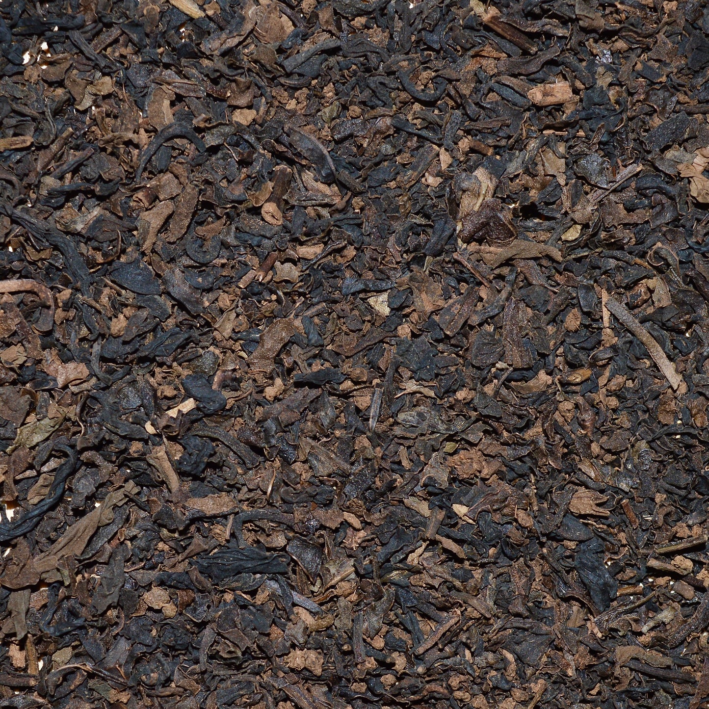 Anytime Black tea, decaf, dried tea leaves up close, decaffeinated black tea