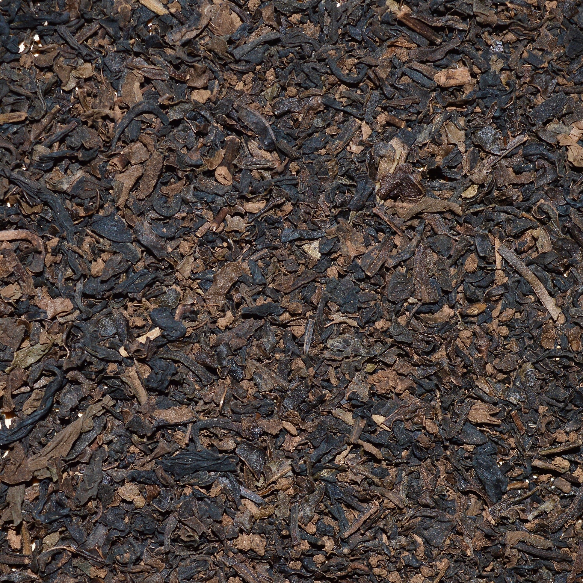 Anytime Black tea, decaf, dried tea leaves up close, decaffeinated black tea