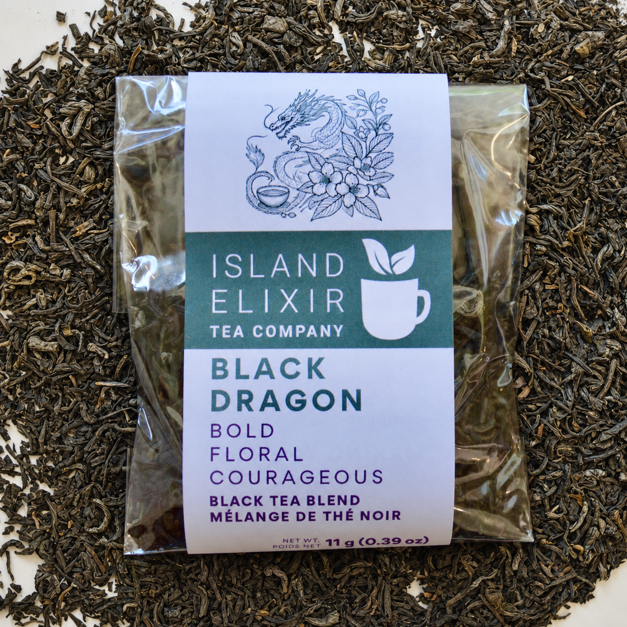 Black Dragon loose leaf black tea sitting on loose leaf tea that contains Black tea*, Jasmine scented green tea*.