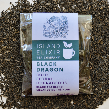 Black Dragon loose leaf black tea sitting on loose leaf tea that contains Black tea*, Jasmine scented green tea*.