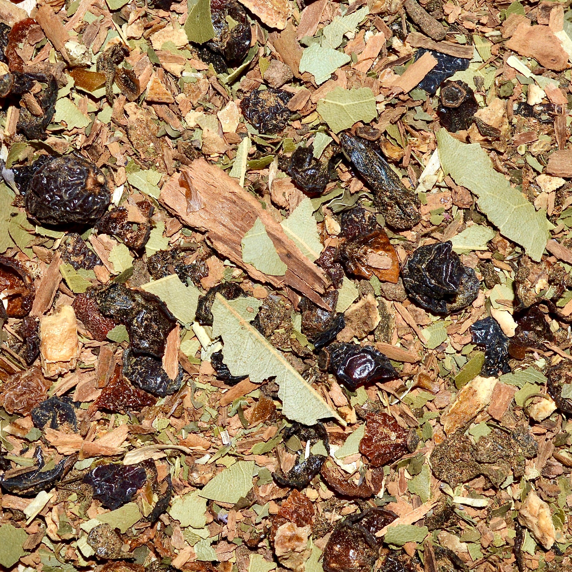 Cinnamon Sunshine Loose Leaf Herbal Tea close-up showing cinnamon, rose hips, lemon, bay leaf, clove, spearmint and anise hyssop.