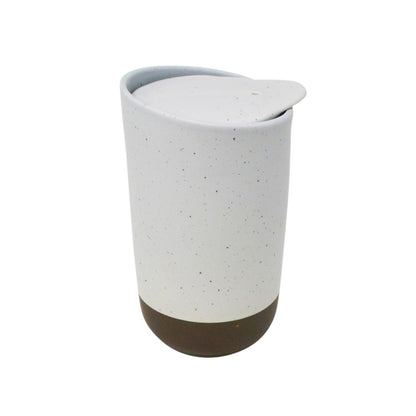 A tall, cylindrical double-walled ceramic travel tumbler with a beige speckled body, a dark brown base, and a matching speckled lid, shown on a plain white background. Holds 325 mL tea or coffee or hot chocolate or any drink. Available for purchase online or in our Langford BC tea shop.