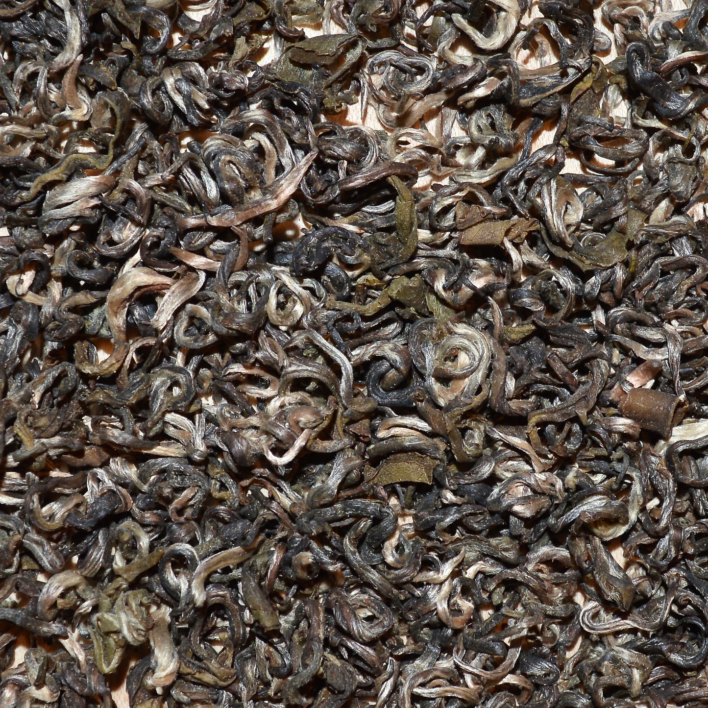 Farmers Green Dried green tea leaves close up