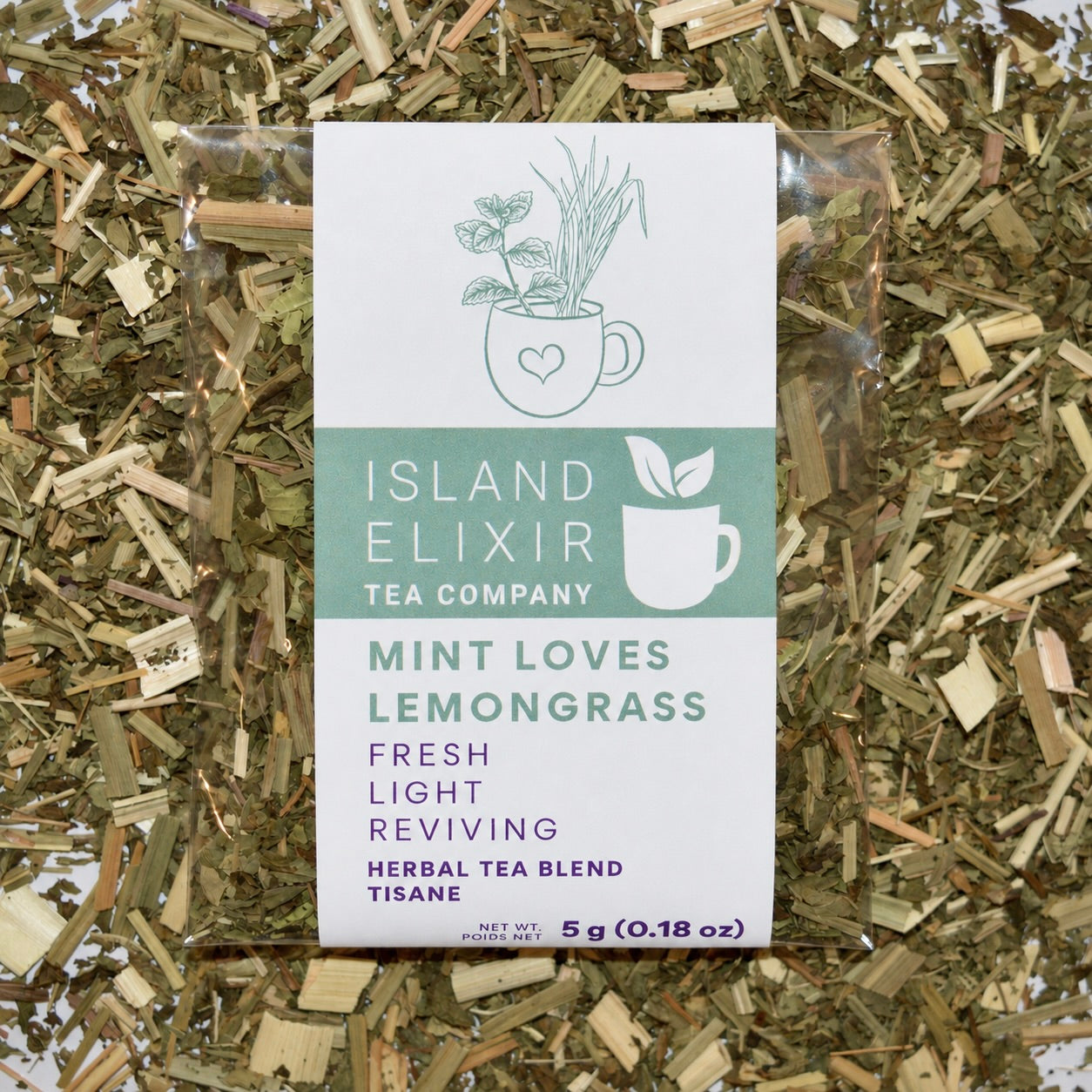 Mint loves lemongrass Herbal Tea 4 cups of tea size compostable packaging sitting on loose leaf tea that contains Lemongrass*, peppermint*, spearmint*, lemon verbena*