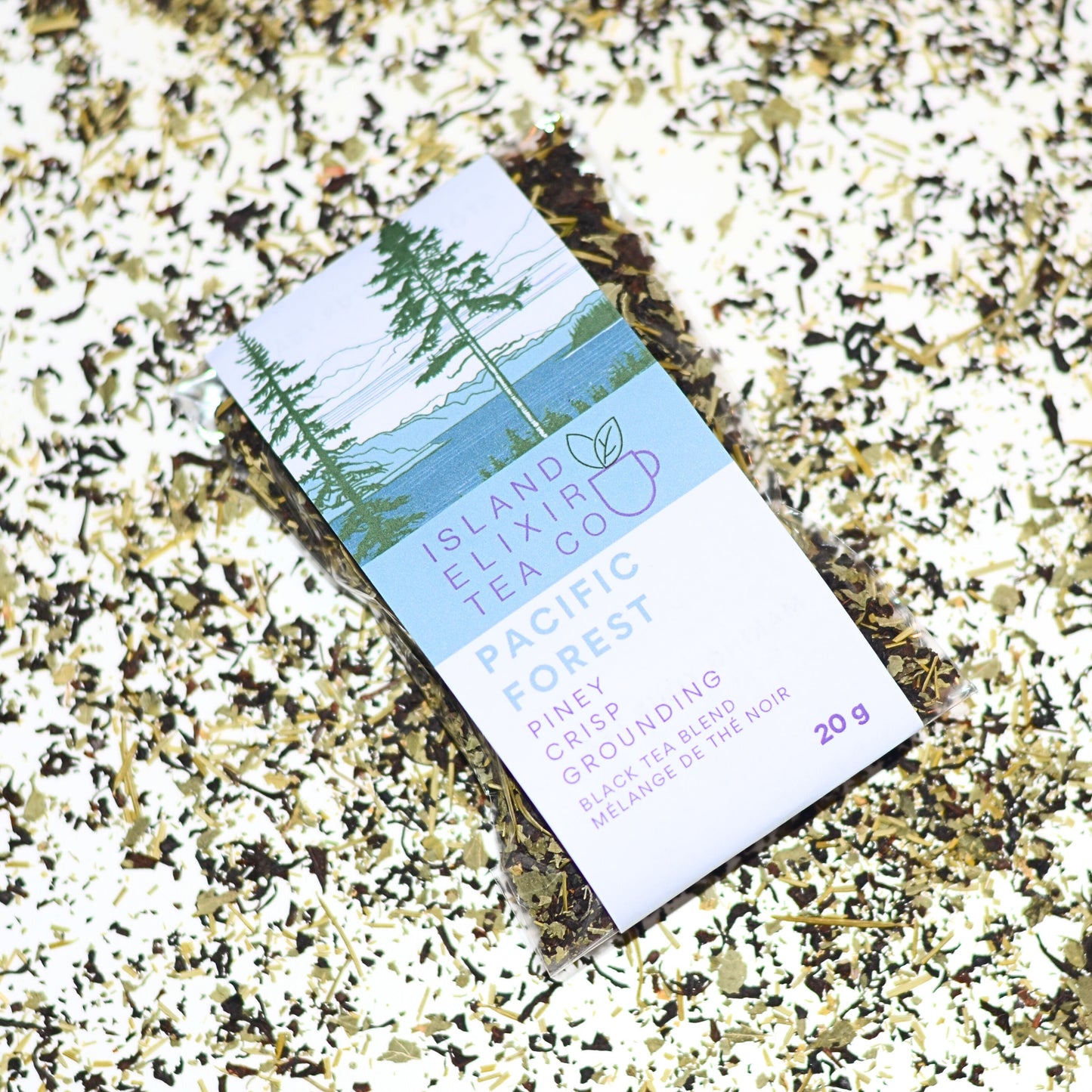 Pacific Forest Tea - a blend of Douglas Fir needles (carefully wild harvested on Vancouver Island), Sri Lankan black tea (also known as Ceylon tea), and nettle leaves. A crisp and piney blend that is grounding, refreshing and surprisingly sweet