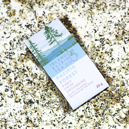 Pacific Forest Tea - a blend of Douglas Fir needles (carefully wild harvested on Vancouver Island), Sri Lankan black tea (also known as Ceylon tea), and nettle leaves. A crisp and piney blend that is grounding, refreshing and surprisingly sweet