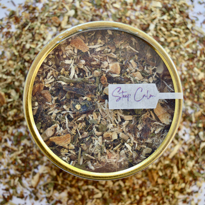 Rooibos Soother Herbal Tea 30 cups of tea size gold finish tin sitting on loose leaf tea that contains Marshmallow root, lemon, rooibos, elderflower, peppermint