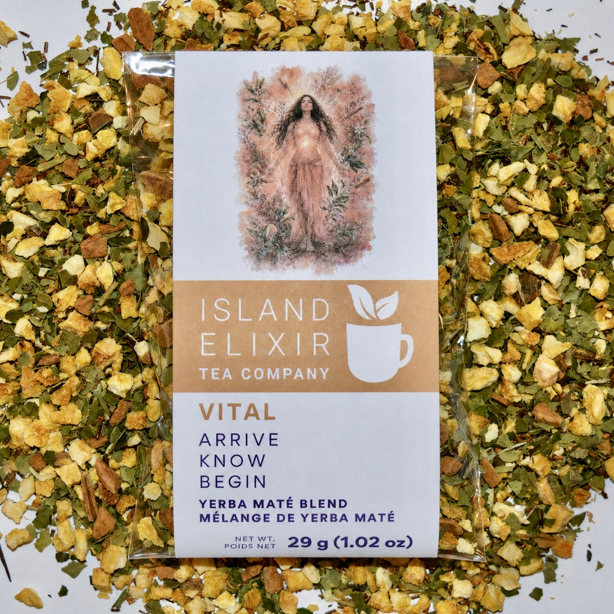 Vital Herbal Tea 10 cups of tea size compostable packaging sitting on loose leaf tea that contains orange pieces*, Yerba Maté*, Cinnamon (true)*, Rooibos*.